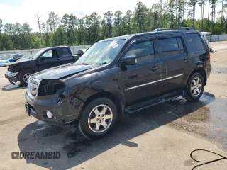 2009 Honda Pilot Touring z VIN 5FNYF38849B027584, wystawiony jako Copart lot #58077895 z przebiegiem 186 629 mil mil oraz Szkoda całkowita • Salvage title. Historia ofert i sprzedaży dostępna na DreamBid. Obrazek 1.