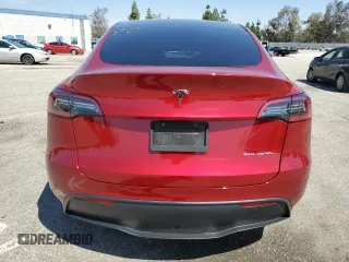 2024 Tesla Model Y Long Range with VIN 7SAYGAEE0RF016323, listed as a Copart auction lot 50253205 with 12,490 mi miles and Salvage title. Bid and sale history available at DreamBid. Image 6.