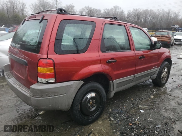 2001 Ford Escape XLS with VIN 1FMYU02181KA64401, listed as a Copart auction lot 44216825 with 196,408 mi miles and Salvage Title. Bid and sale history available at carsss.com. Image 3.