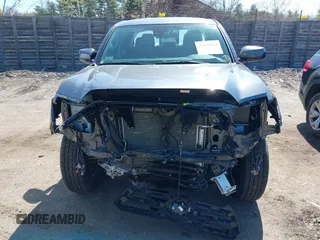 2023 Toyota Tacoma SR with VIN 3TMCZ5AN0PM614127, listed as a IAAI auction lot 41974924 with 12,674 mi miles and . Bid and sale history available at DreamBid. Image 6.