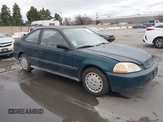 1997 Honda Civic DX with VIN 1HGEJ6128VL023684, listed as a IAAI auction lot 41502999 with 140,871 mi miles. Bid and sale history available at carsss.com. Image 1.