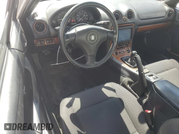 2000 Mazda MX-5 Miata with VIN JM1NB3531Y0152594, listed as a Copart auction lot 57460195 with 78,139 mi miles and Salvage title. Bid and sale history available at DreamBid. Image 8.