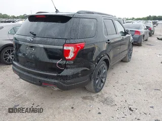 2018 Ford Explorer XLT z VIN 1FM5K7D89JGA54989, wystawiony jako IAAI lot #42170343 z przebiegiem 126 819 mil mil oraz . Historia ofert i sprzedaży dostępna na DreamBid. Obrazek 4.