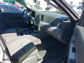 2007 Jeep Grand Cherokee Laredo with VIN 1J8HR48P87C687411, listed as a IAAI auction lot 41774029 with 212,763 mi miles. Bid and sale history available at carsss.com. Image 5.