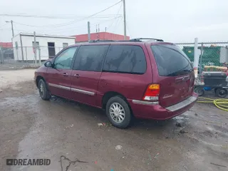 2000 Ford Windstar Wagon SE with VIN 2FMZA5242YBA26977, listed as a IAAI auction lot 41499880 with 1 mi miles. Bid and sale history available at carsss.com. Image 3.