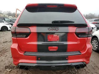 2020 Jeep Grand Cherokee Trackhawk with VIN 1C4RJFN95LC334610, listed as a Copart auction lot 49160944 with 23,348 mi miles and Salvage title. Bid and sale history available at DreamBid. Image 6.