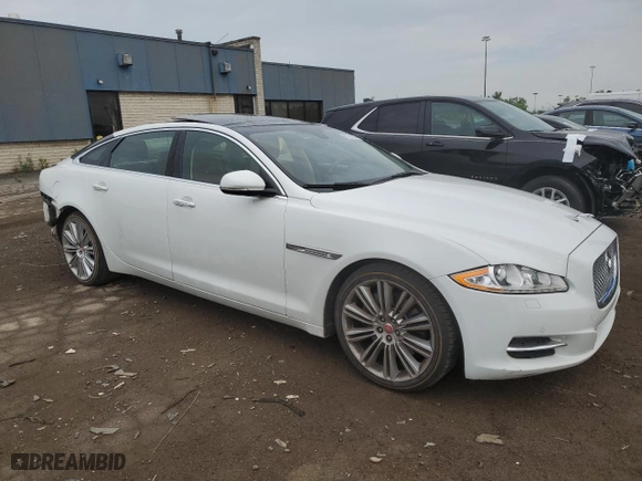 2014 Jaguar XJ with VIN SAJWJ2GD3E8V64988, listed as a Copart auction lot 55375034 with 0 mi miles and Clean Title. Bid and sale history available at carsss.com. Image 4.