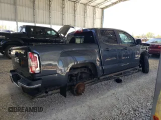 2015 GMC Canyon 2WD with VIN 1GTG5AEA1F1220130, listed as a Copart auction lot 52548195 with 152,989 mi miles and Clean title. Bid and sale history available at DreamBid. Image 3.