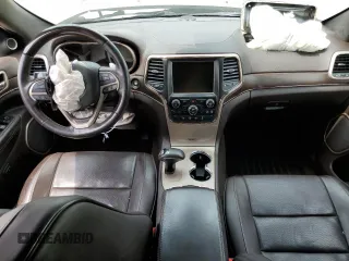 2014 Jeep Grand Cherokee Summit с VIN 1C4RJFJGXEC436797, выставлен на аукционе Copart как лот 60248595 с пробегом 156 395 миль миль и Списание • Salvage title. История ставок и продаж доступна на DreamBid. Изображение 8.