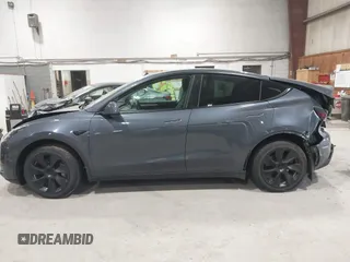 2023 Tesla Model Y Long Range with VIN 7SAYGAEE2PF755674, listed as a IAAI auction lot 41890025 with 24,783 mi miles and . Bid and sale history available at DreamBid. Image 14.