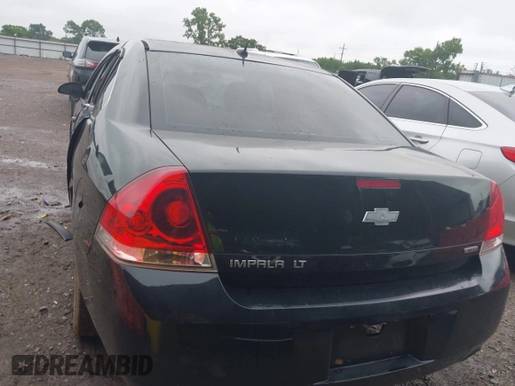 2014 Chevrolet Impala LT with VIN 2G1WB5E39E1104995, listed as a IAAI auction lot 42420840 with 11 mi miles and . Bid and sale history available at DreamBid. Image 3.