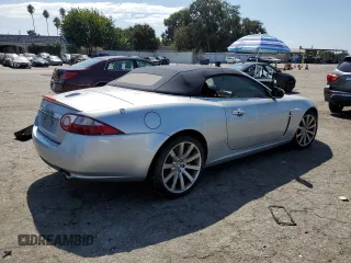 2007 Jaguar XK with VIN SAJDA44B975B03114, listed as a Copart auction lot 72181684 with 55,338 mi miles and Salvage Title. Bid and sale history available at carsss.com. Image 3.