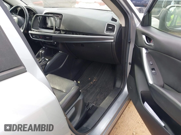 2016 Mazda CX-5 Grand Touring with VIN JM3KE4DY1G0616714, listed as a IAAI auction lot 41459781 with 90,763 mi miles. Bid and sale history available at carsss.com. Image 5.
