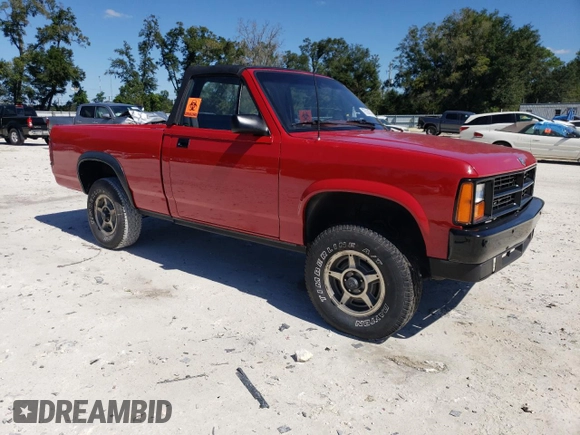 1989 Dodge Dakota z VIN 1B7GG69X9KS181359, wystawiony jako Copart lot #75638874 z przebiegiem 104 095 mil mil oraz Szkoda całkowita • Salvage title. Historia ofert i sprzedaży dostępna na DreamBid. Obrazek 4.