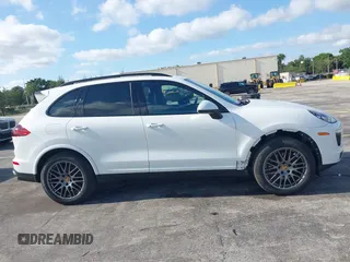 2018 Porsche Cayenne z VIN WP1AA2A27JKA02278, wystawiony jako IAAI lot #42161741 z przebiegiem 62 217 mil mil oraz . Historia ofert i sprzedaży dostępna na DreamBid. Obrazek 13.