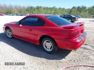 1996 Ford Mustang with VIN 1FALP4044TF203127, listed as a IAAI auction lot 41887713 with 86,008 mi miles. Bid and sale history available at carsss.com. Image 3.