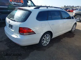 2013 Volkswagen Jetta SportWagen TDI w/Sunroof & Nav with VIN 3VWPL7AJ2DM632598, listed as a IAAI auction lot 42043462 with 99,922 mi miles. Bid and sale history available at carsss.com. Image 4.