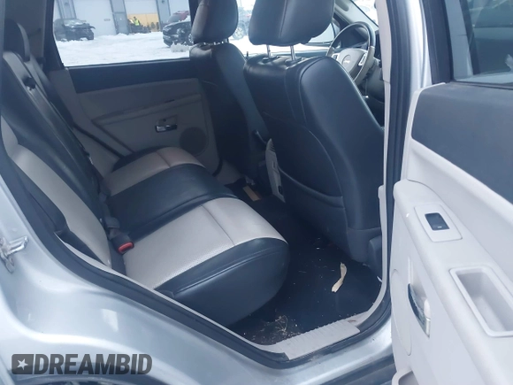 2008 Jeep Grand Cherokee with VIN 1J8HS58M58C117397, listed as a IAAI auction lot 41298484 with 208,095 mi miles and . Bid and sale history available at DreamBid. Image 8.