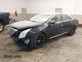 2013 Cadillac XTS Luxury with VIN 2G61P5S34D9200849, listed as a IAAI auction lot 41412189 with 134,932 mi miles. Bid and sale history available at carsss.com. Image 17.