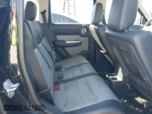 2007 Dodge Nitro SLT z VIN 1D8GU58K87W555759, wystawiony jako IAAI lot #41690213 z przebiegiem 196 779 mil mil oraz . Historia ofert i sprzedaży dostępna na DreamBid. Obrazek 8.