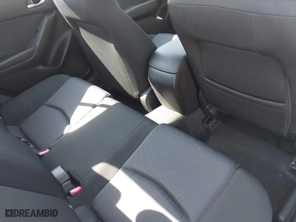 2014 Mazda Mazda3 i SV with VIN JM1BM1T77E1184656, listed as a IAAI auction lot 41703402 with 57,025 mi miles. Bid and sale history available at carsss.com. Image 8.