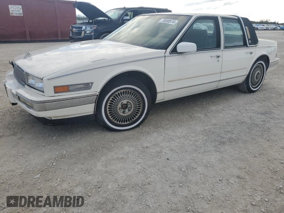 1987 Cadillac Seville z VIN 1G6KS518XHU812739, wystawiony jako Copart lot #79308574 z przebiegiem Nie podano mil oraz Szkoda całkowita • Salvage title. Historia ofert i sprzedaży dostępna na DreamBid. Obrazek 1.
