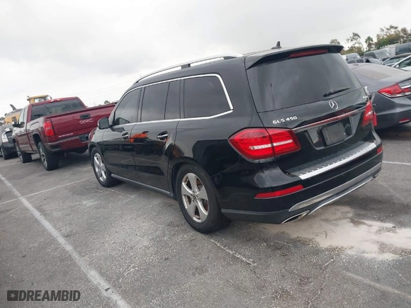 2019 Mercedes-Benz GLS with VIN 4JGDF6EE4KB581352, listed as a IAAI auction lot 40340947 with 79,067 mi miles. Bid and sale history available at carsss.com. Image 3.