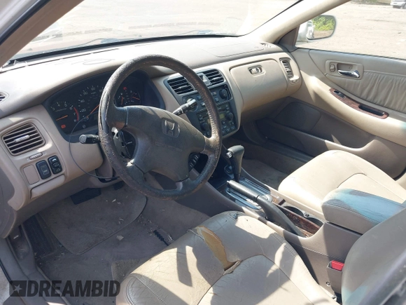 2001 Honda Accord EX z VIN 1HGCG56611A124406, wystawiony jako IAAI lot #42401266 z przebiegiem 177 917 mil mil oraz . Historia ofert i sprzedaży dostępna na DreamBid. Obrazek 5.