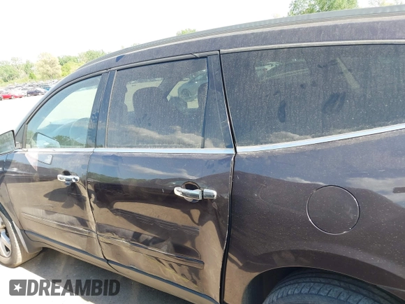 2016 Chevrolet Traverse LT with VIN 1GNKRGKD6GJ183391, listed as a IAAI auction lot 42268807 with 137,926 mi miles and . Bid and sale history available at DreamBid. Image 13.