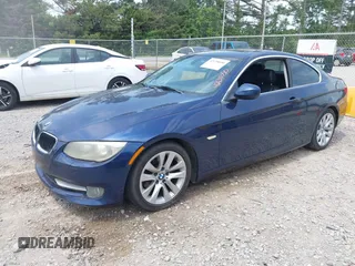 2011 BMW 3 Series 328i with VIN WBAKE3C52BE557501, listed as a IAAI auction lot 42138050 with 209,575 mi miles and . Bid and sale history available at carsss.com. Image 2.