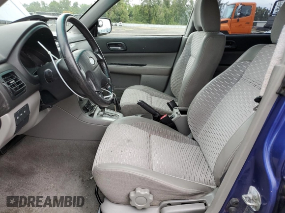 2003 Subaru Forester XS with VIN JF1SG656X3H700009, listed as a Copart auction lot 71077514 with 249,471 mi miles and Salvage Title. Bid and sale history available at carsss.com. Image 7.