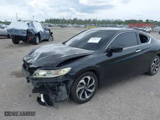 2016 Honda Accord Coupe LX-S with VIN 1HGCT1B35GA001653, listed as a IAAI auction lot 41756197 with 167,897 mi miles. Bid and sale history available at carsss.com. Image 2.