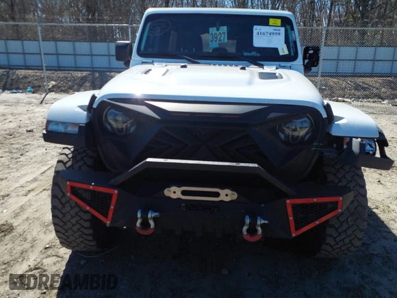 2023 Jeep Wrangler Rubicon with VIN 1C4HJXFG8PW655138, listed as a IAAI auction lot 41674959 with 40,790 mi miles and . Bid and sale history available at DreamBid. Image 12.