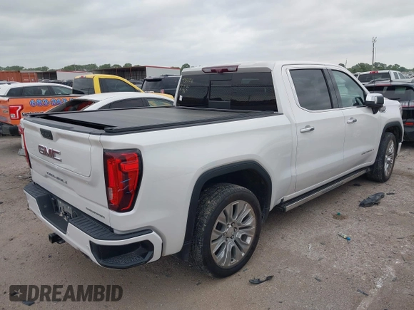 2022 GMC Sierra 1500 Denali with VIN 3GTU9FELXNG127029, listed as a IAAI auction lot 42062882 with 24,082 mi miles and . Bid and sale history available at DreamBid. Image 4.