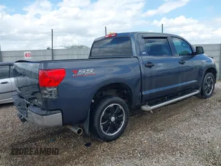 2010 Toyota Tundra 4WD Truck with VIN 5TFDW5F17AX138480, listed as a IAAI auction lot 41927807 with 157,580 mi miles. Bid and sale history available at carsss.com. Image 4.