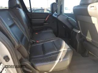 2006 Infiniti QX56 z VIN 5N3AA08A16N804708, wystawiony jako Copart lot #86788354 z przebiegiem 205 417 mil mil oraz Czysty tytuł • Clean title. Historia ofert i sprzedaży dostępna na DreamBid. Obrazek 10.