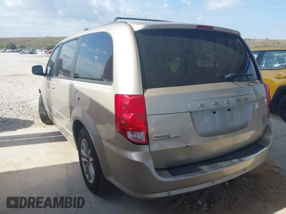 2014 Dodge Grand Caravan SXT with VIN 2C4RDGCG8ER244201, listed as a IAAI auction lot 42017091 with 161,653 mi miles and . Bid and sale history available at DreamBid. Image 3.