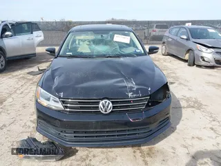 2016 Volkswagen Jetta Sedan 1.4T SE with VIN 3VWD67AJ3GM390273, listed as a IAAI auction lot 41575074 with 114,705 mi miles. Bid and sale history available at carsss.com. Image 13.