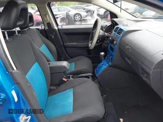 2009 Dodge Caliber SXT z VIN 1B3HB48A39D163685, wystawiony jako IAAI lot #42193202 z przebiegiem 97 479 mil mil oraz . Historia ofert i sprzedaży dostępna na DreamBid. Obrazek 5.