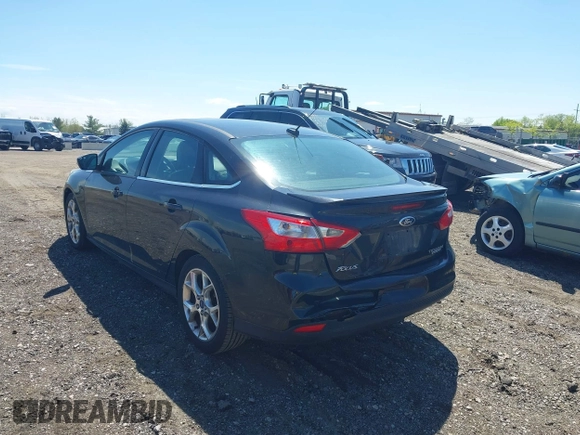 2013 Ford Focus Titanium with VIN 1FADP3J22DL106166, listed as a IAAI auction lot 42233351 with 108,300 mi miles and . Bid and sale history available at carsss.com. Image 3.