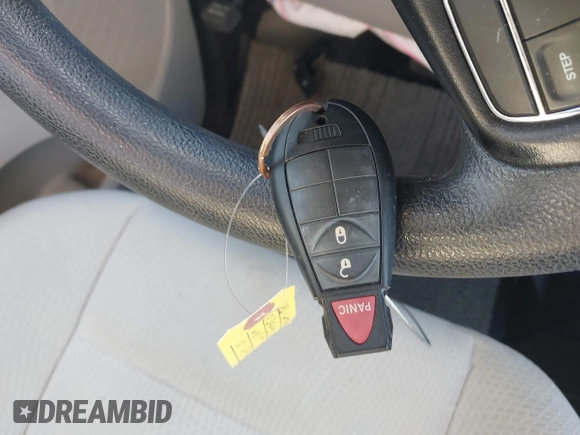2019 Dodge Grand Caravan SE with VIN 2C7WDGBG7KR803126, listed as a IAAI auction lot 40835937 with 63,100 mi miles and . Bid and sale history available at DreamBid. Image 11.