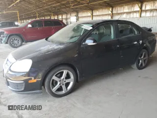 2009 Volkswagen Jetta S z VIN 3VWJZ71K99M153373, wystawiony jako Copart lot #64245345 z przebiegiem 192 419 mil mil oraz Szkoda całkowita • Salvage title. Historia ofert i sprzedaży dostępna na DreamBid. Obrazek 1.