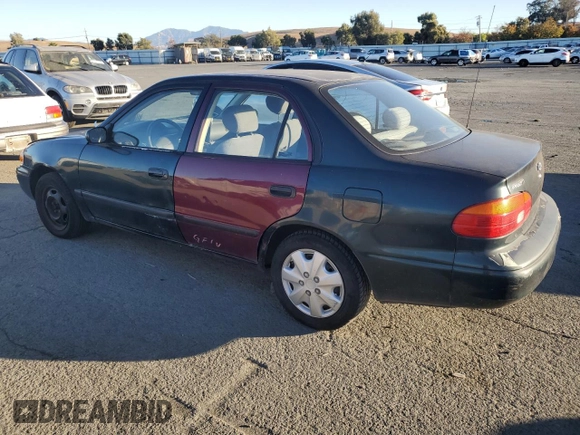 1999 Chevrolet Prizm z VIN 1Y1SK5289XZ411868, wystawiony jako Copart lot #79348064 z przebiegiem 175 202 mil mil oraz Czysty tytuł • Clean title. Historia ofert i sprzedaży dostępna na DreamBid. Obrazek 2.