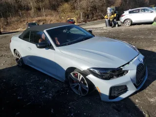 2024 BMW 4 Series 430i xDrive with VIN WBA43AT01RCP28302, listed as a Copart auction lot 82174584 with 11,235 mi miles and Salvage Title. Bid and sale history available at carsss.com. Image 4.