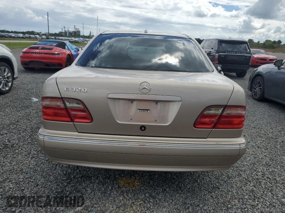 2002 Mercedes-Benz E-Class with VIN WDBJF65J82B397776, listed as a Copart auction lot 73745144 with 0 mi miles and Salvage Title. Bid and sale history available at carsss.com. Image 6.