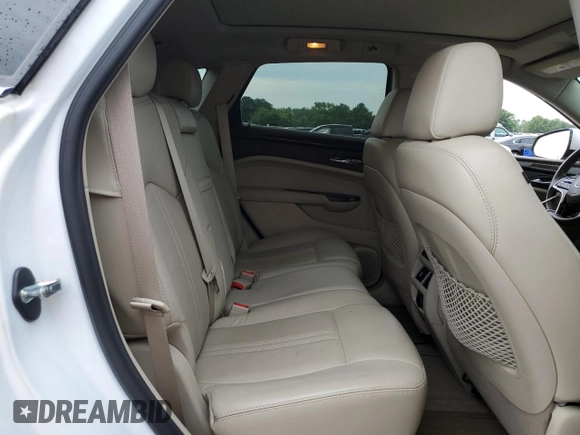 2016 Cadillac SRX Performance Collection with VIN 3GYFNCE31GS580002, listed as a Copart auction lot 62667475 with 135,097 mi miles and Salvage title. Bid and sale history available at DreamBid. Image 11.