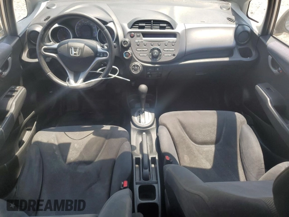 2009 Honda Fit Sport with VIN JHMGE88449S012139, listed as a Copart auction lot 60046185 with 255,292 mi miles and Clean title. Bid and sale history available at DreamBid. Image 8.