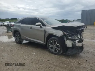 2017 Lexus RX 350 with VIN 2T2ZZMCA0HC087629, listed as a Copart auction lot 56482705 with 101,374 mi miles and Salvage title. Bid and sale history available at DreamBid. Image 4.