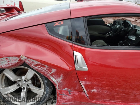 2009 Nissan 370Z z VIN JN1AZ44E19M400603, wystawiony jako Copart lot #79878474 z przebiegiem 129 976 mil mil oraz Szkoda całkowita • Salvage title. Historia ofert i sprzedaży dostępna na DreamBid. Obrazek 10.