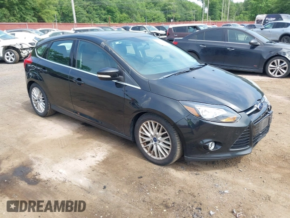2014 Ford Focus Titanium with VIN 1FADP3N2XEL319782, listed as a IAAI auction lot 42615481 with 132,423 mi miles and . Bid and sale history available at DreamBid. Image 1.